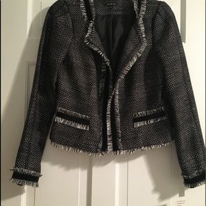 Black and white blazer.